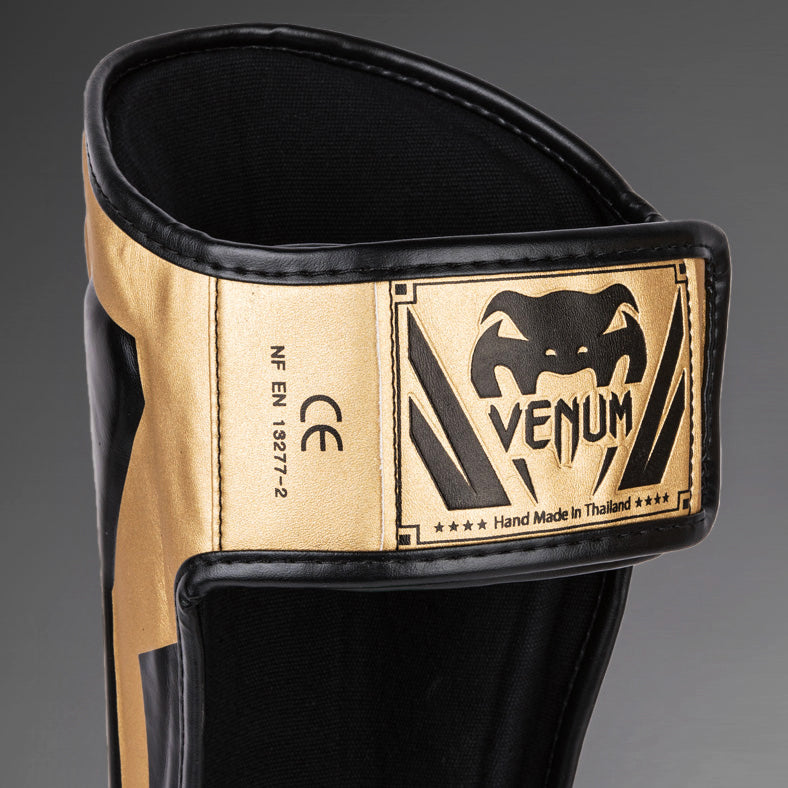 Venum Elite Standup Schienbeinschoner - Gold/Schwarz