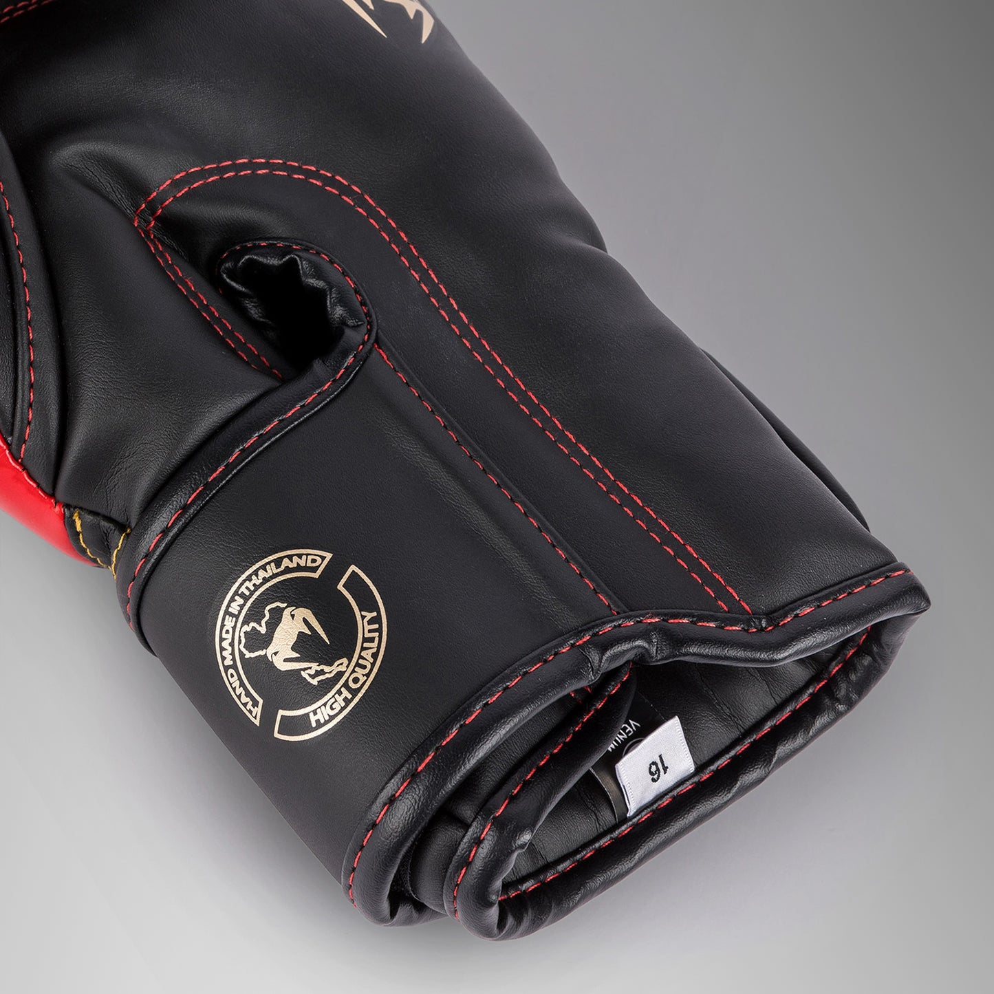Venum Elite Boxhandschuhe - Schwarz/Gold/Rot