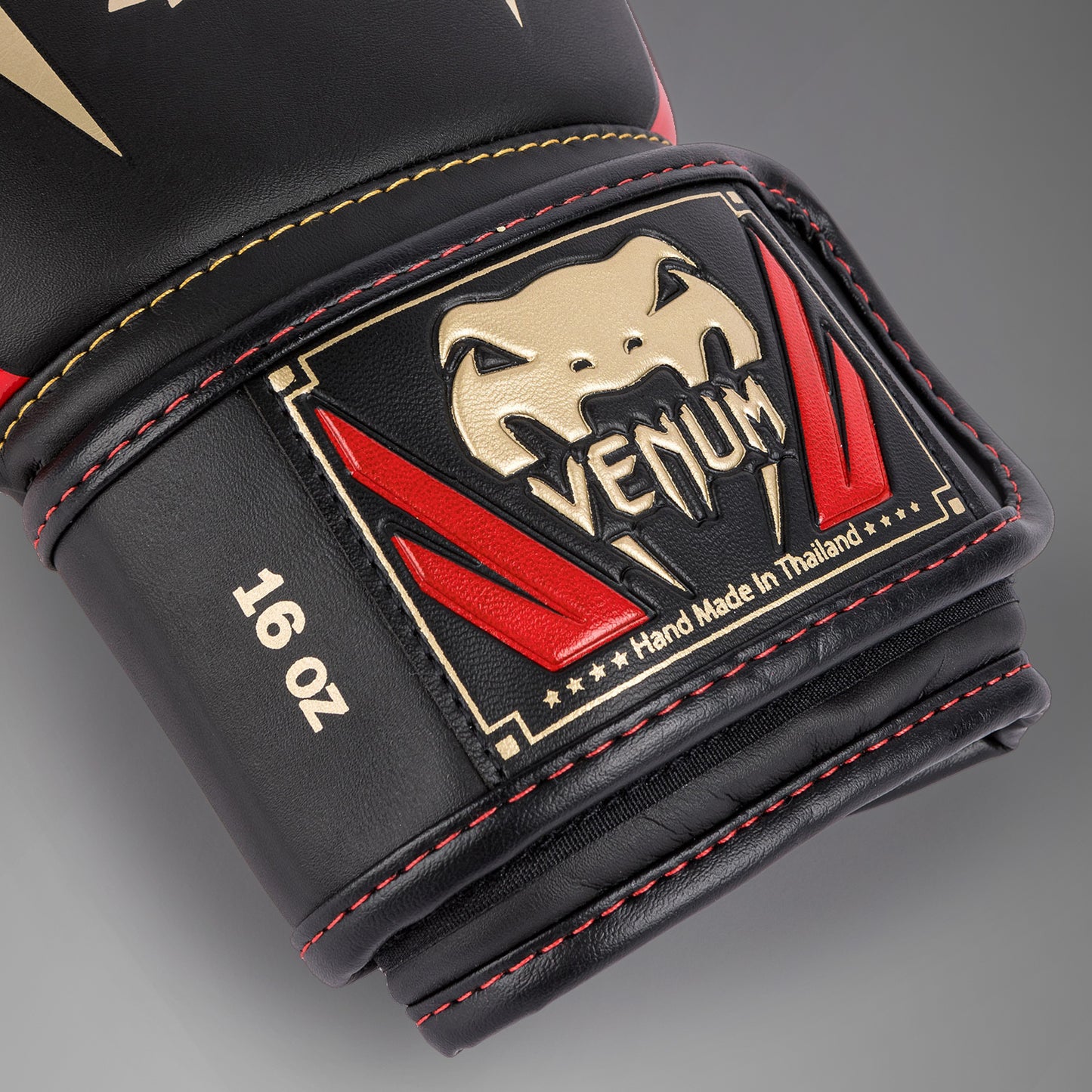 Venum Elite Boxhandschuhe - Schwarz/Gold/Rot