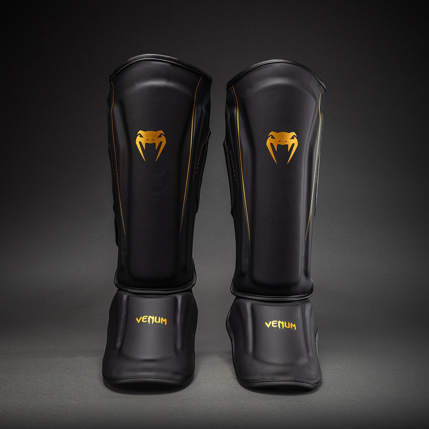 Venum Streamline Schienbeinschoner – Schwarz/Gold