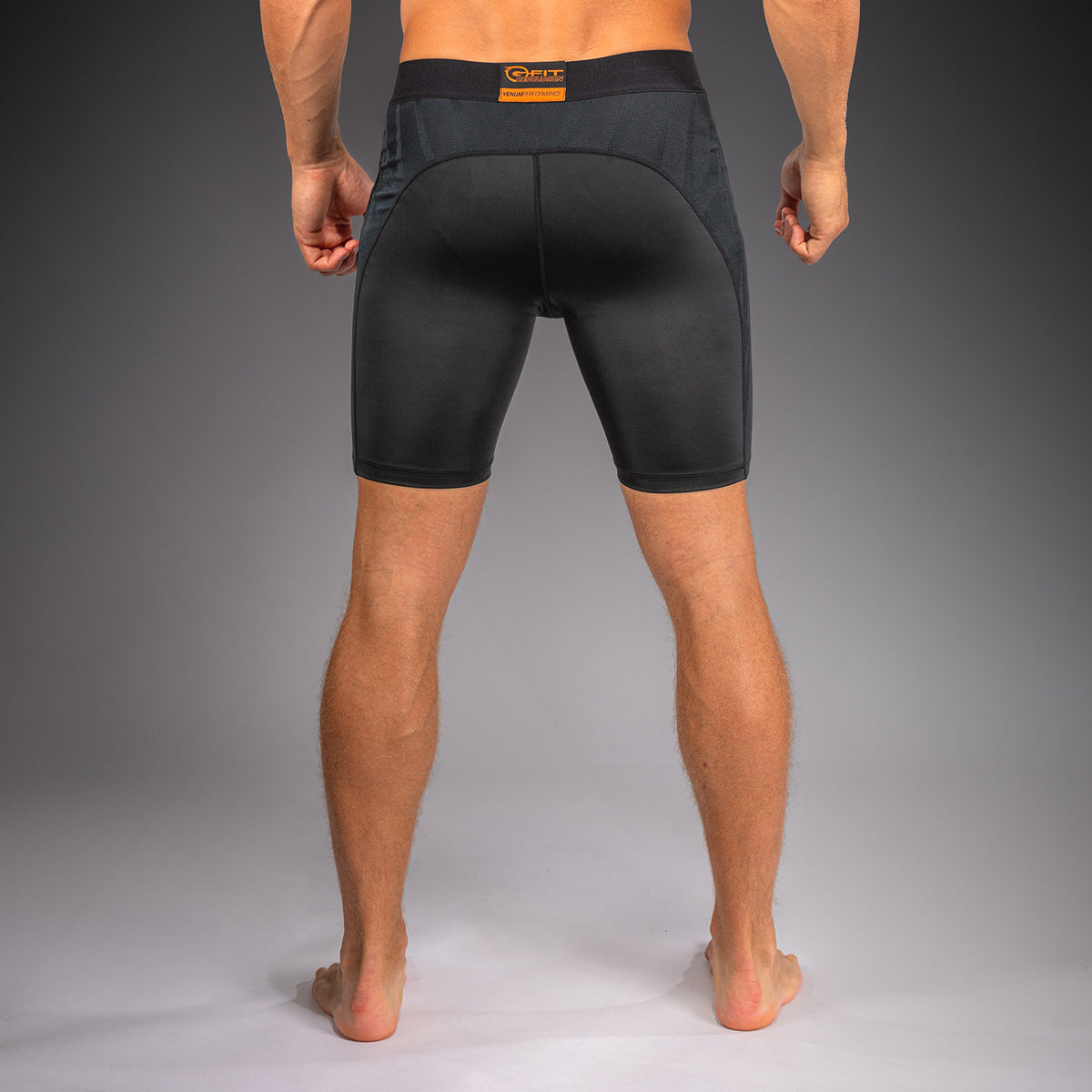 Venum G-Fit Revolution Vale-Tudo-Shorts - Schwarz/Kupfer