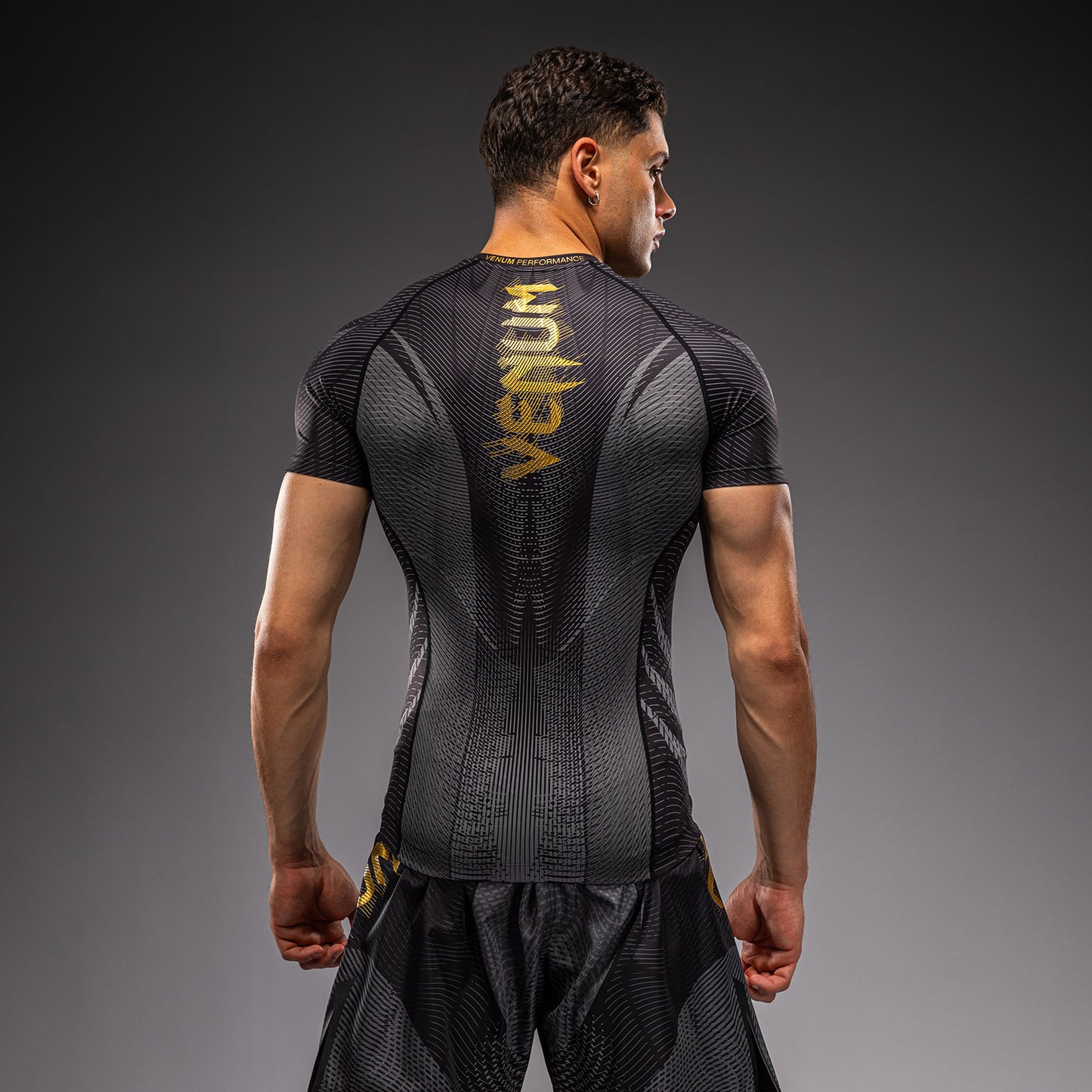 Venum Galactic 3.0 Kurzarm Rashguard - Schwarz/Gold