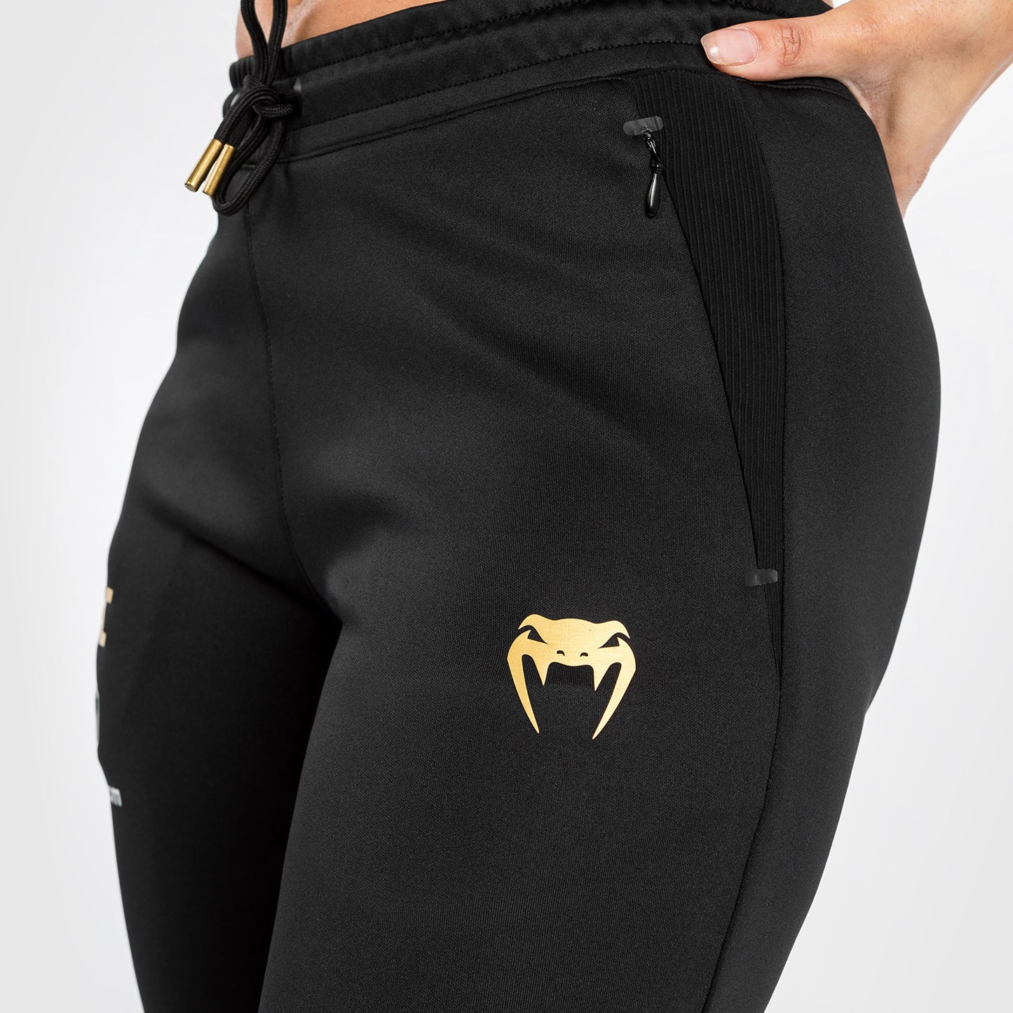 UFC Adrenaline by Venum Authentic Fight Night Walkout-Hose für Frauen Women’s Walkout Pant  - Champion
