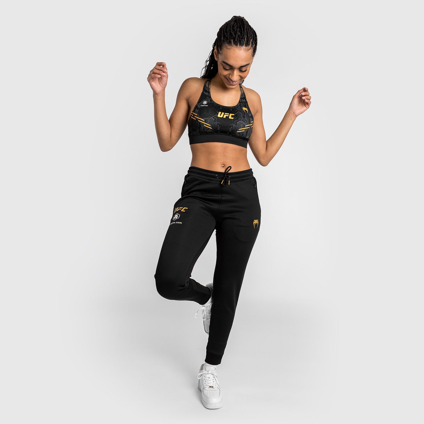 UFC Adrenaline by Venum Authentic Fight Night Walkout-Hose für Frauen Women’s Walkout Pant  - Champion