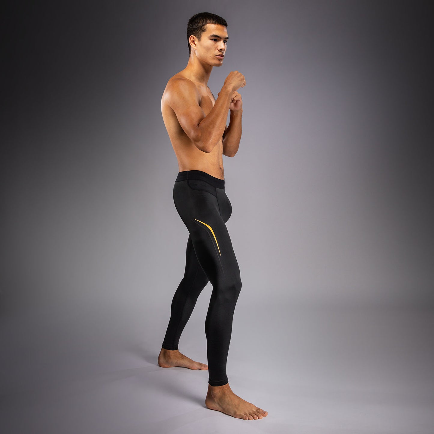 Venum G-Core Spats - Schwarz/Gold