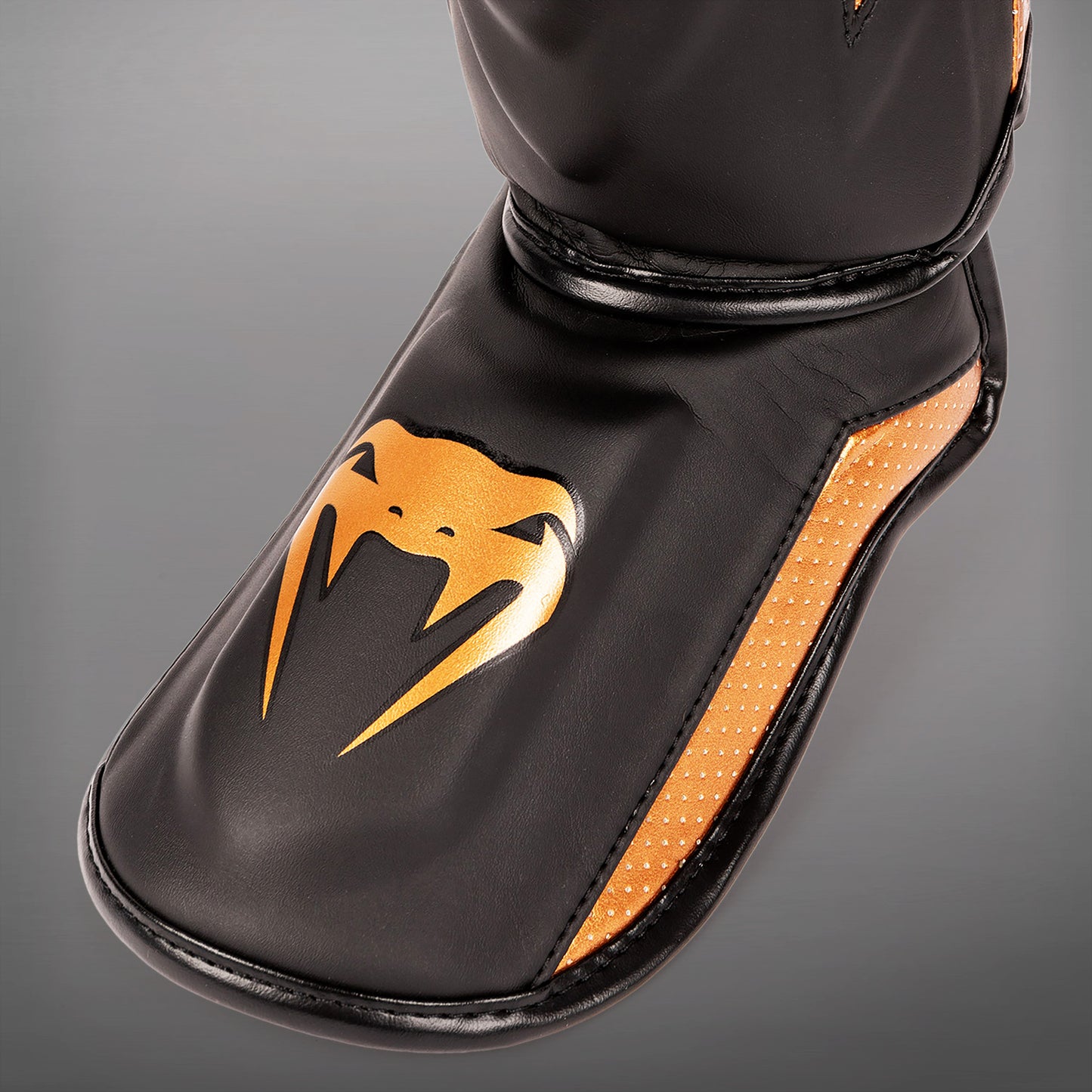 Venum Elite Evo Schienbeinschoner - Schwarz/Bronze