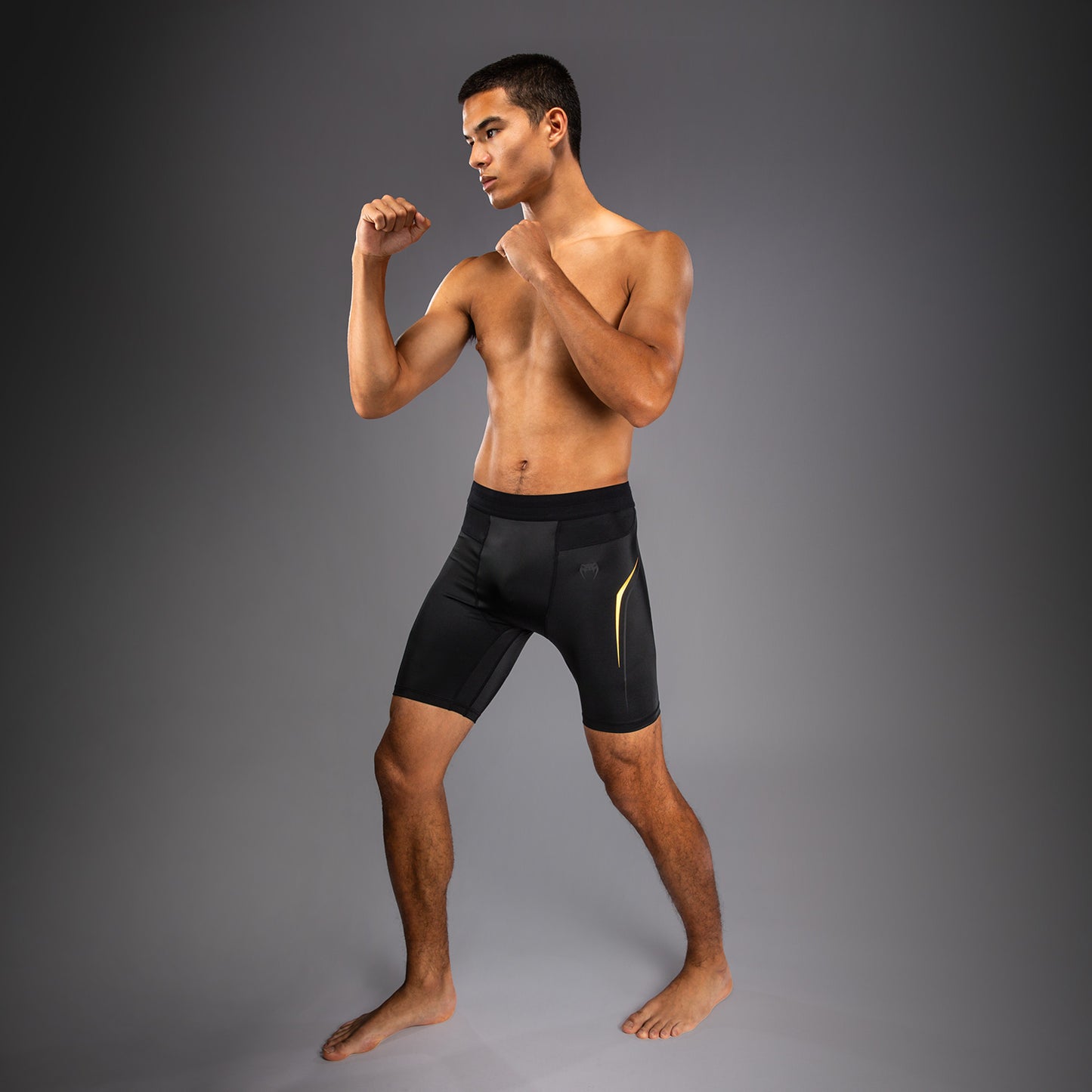 Venum G-Core Vale Tudo Kompressionsshort - Schwarz/Gold
