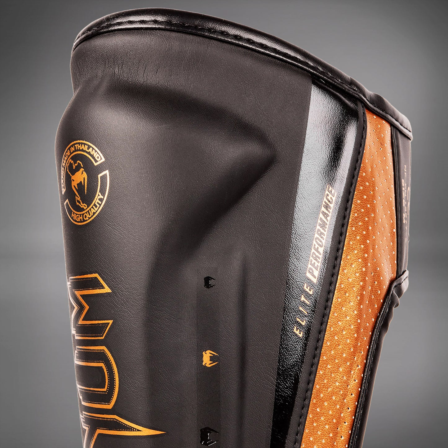 Venum Elite Evo Schienbeinschoner - Schwarz/Bronze