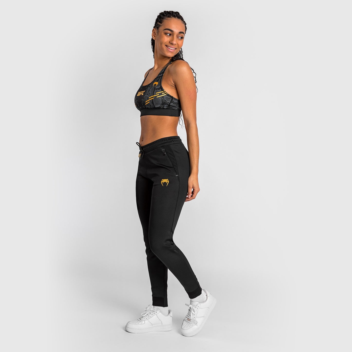 UFC Adrenaline by Venum Authentic Fight Night Walkout-Hose für Frauen Women’s Walkout Pant  - Champion