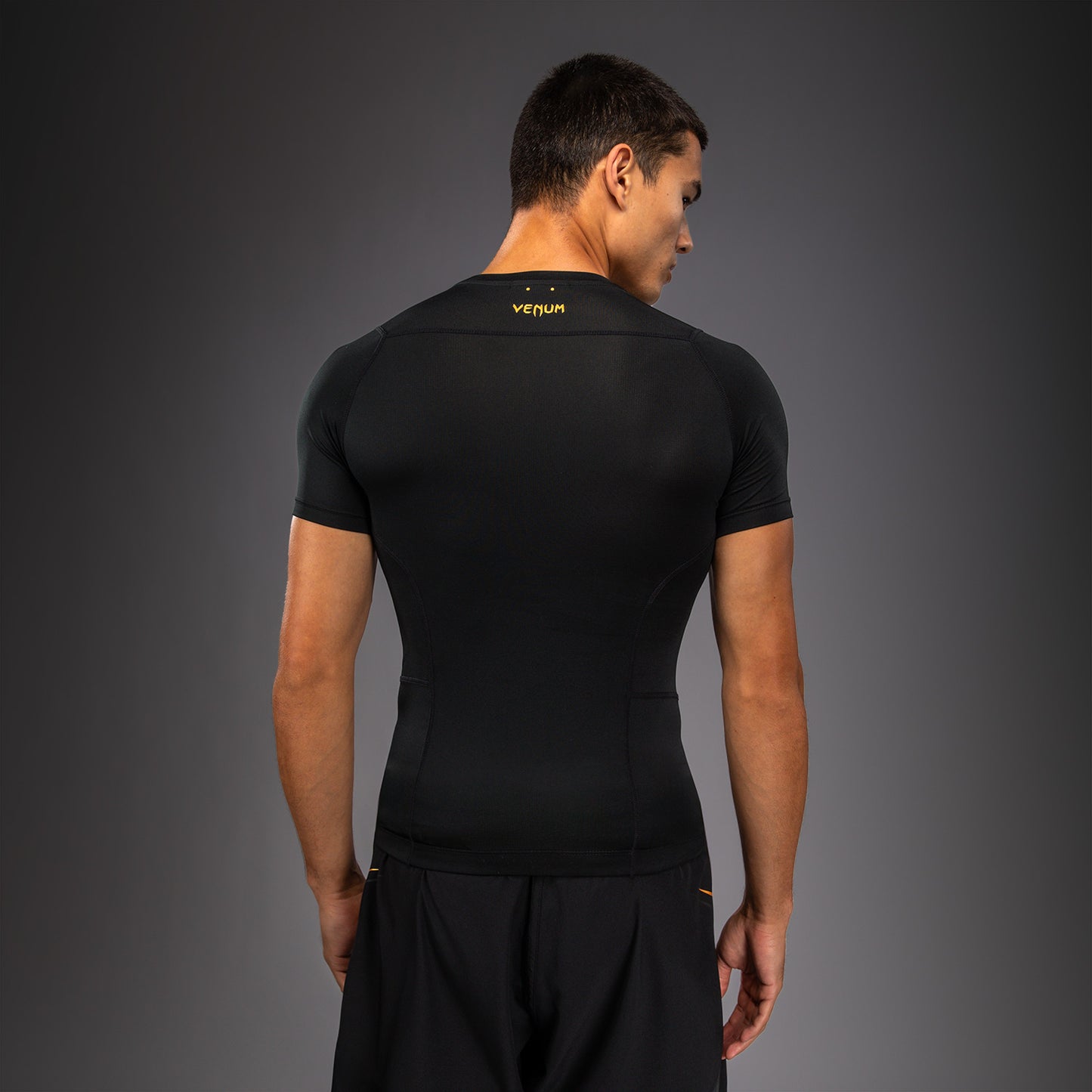 Venum G-Core Kurzarm Rashguard - Schwarz/Gold
