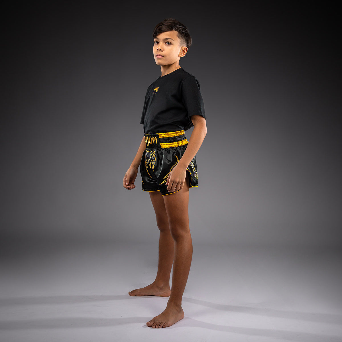 Venum Bangkok Fury Muay-Thai-Shorts für Kinder - Schwarz/Gold