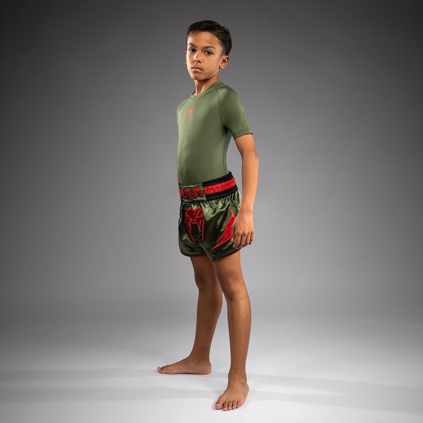Venum Inferno Kinder Muay Thai Shorts - Armeegrün/Orange