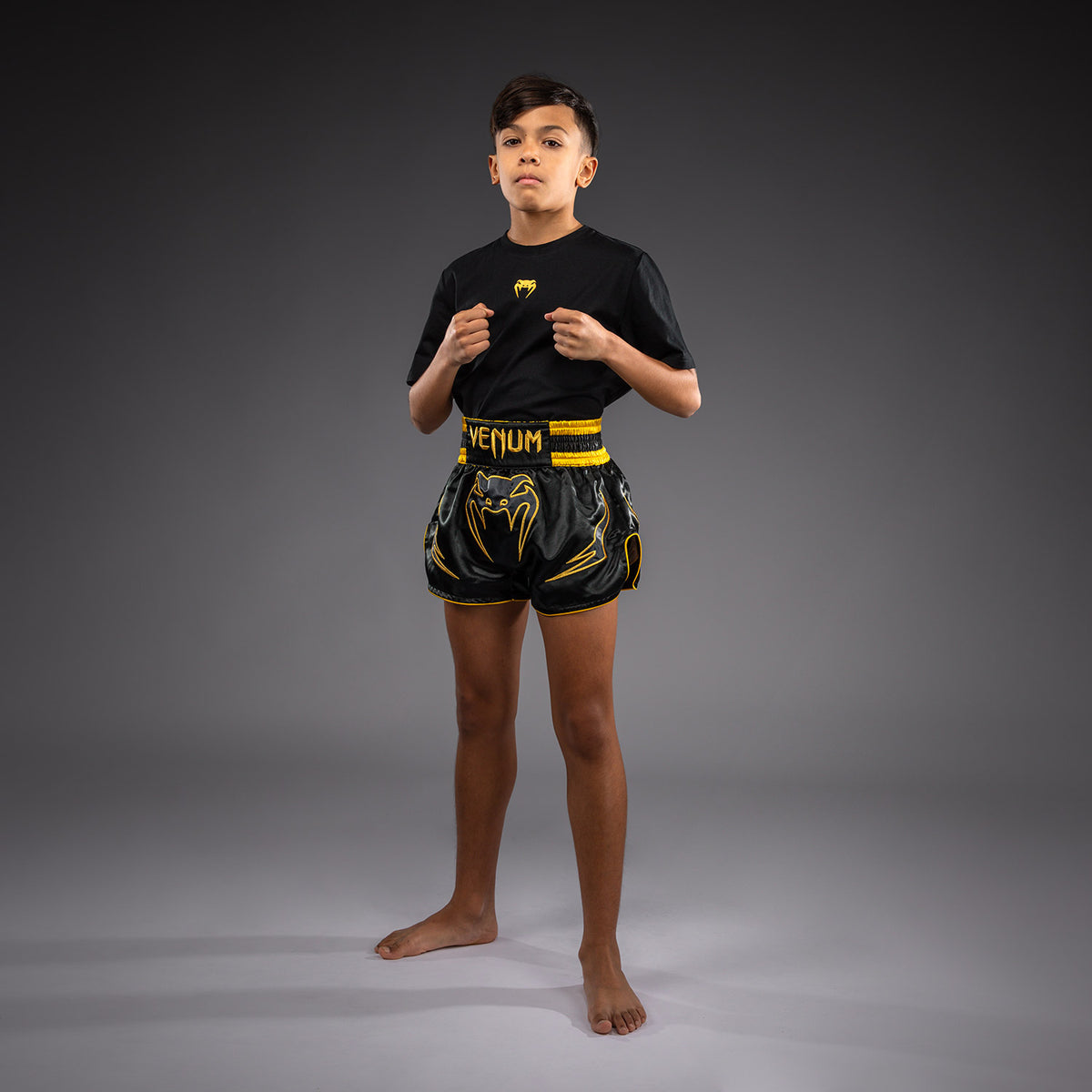 Venum Bangkok Fury Muay-Thai-Shorts für Kinder - Schwarz/Gold