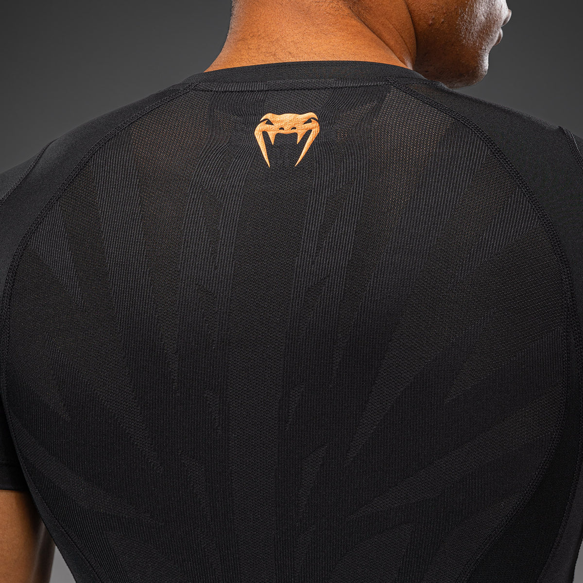Venum G-Fit Revolution Kurzarm-Rashguard - Schwarz/Kupfer
