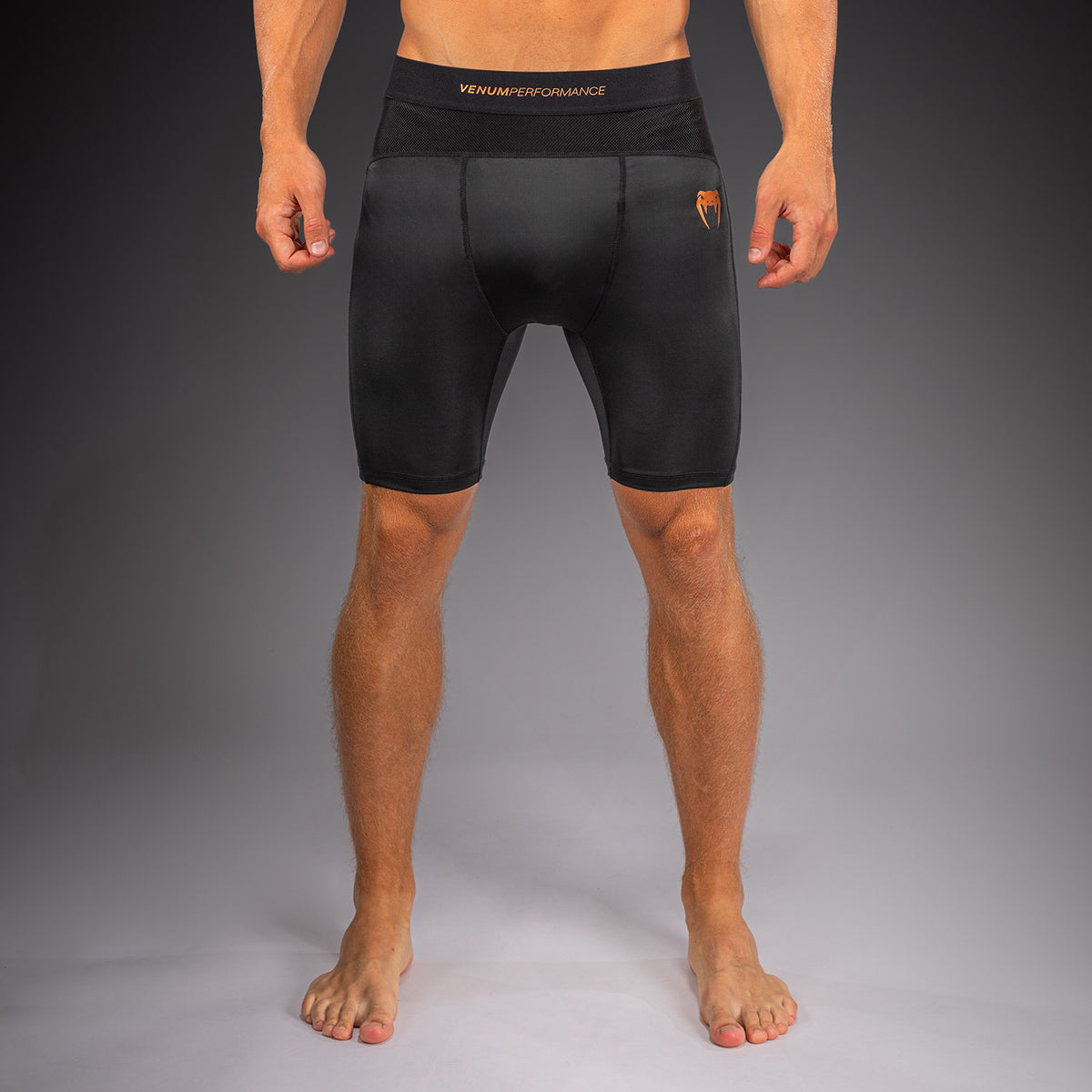 Venum G-Fit Revolution Vale-Tudo-Shorts - Schwarz/Kupfer