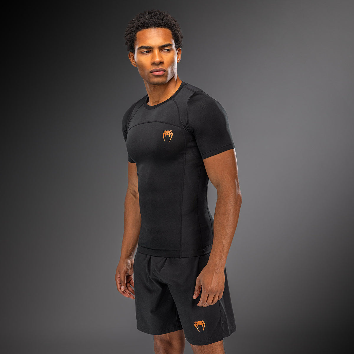 Venum G-Fit Revolution Kurzarm-Rashguard - Schwarz/Kupfer