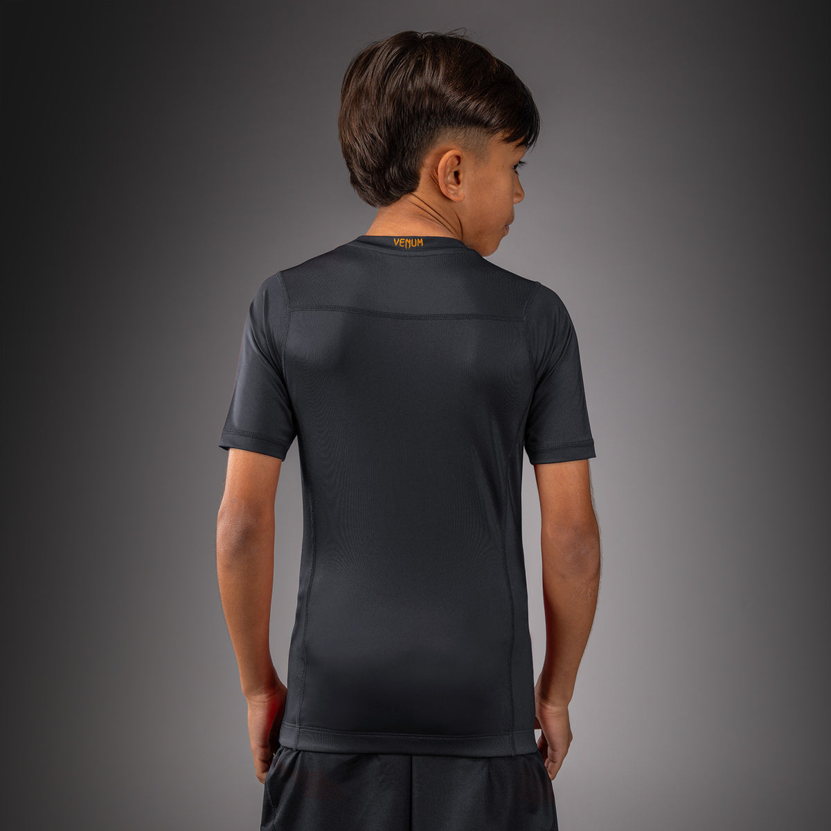 Venum Attack Kurzarm-Rashguard für Kinder - Schwarz/Gold