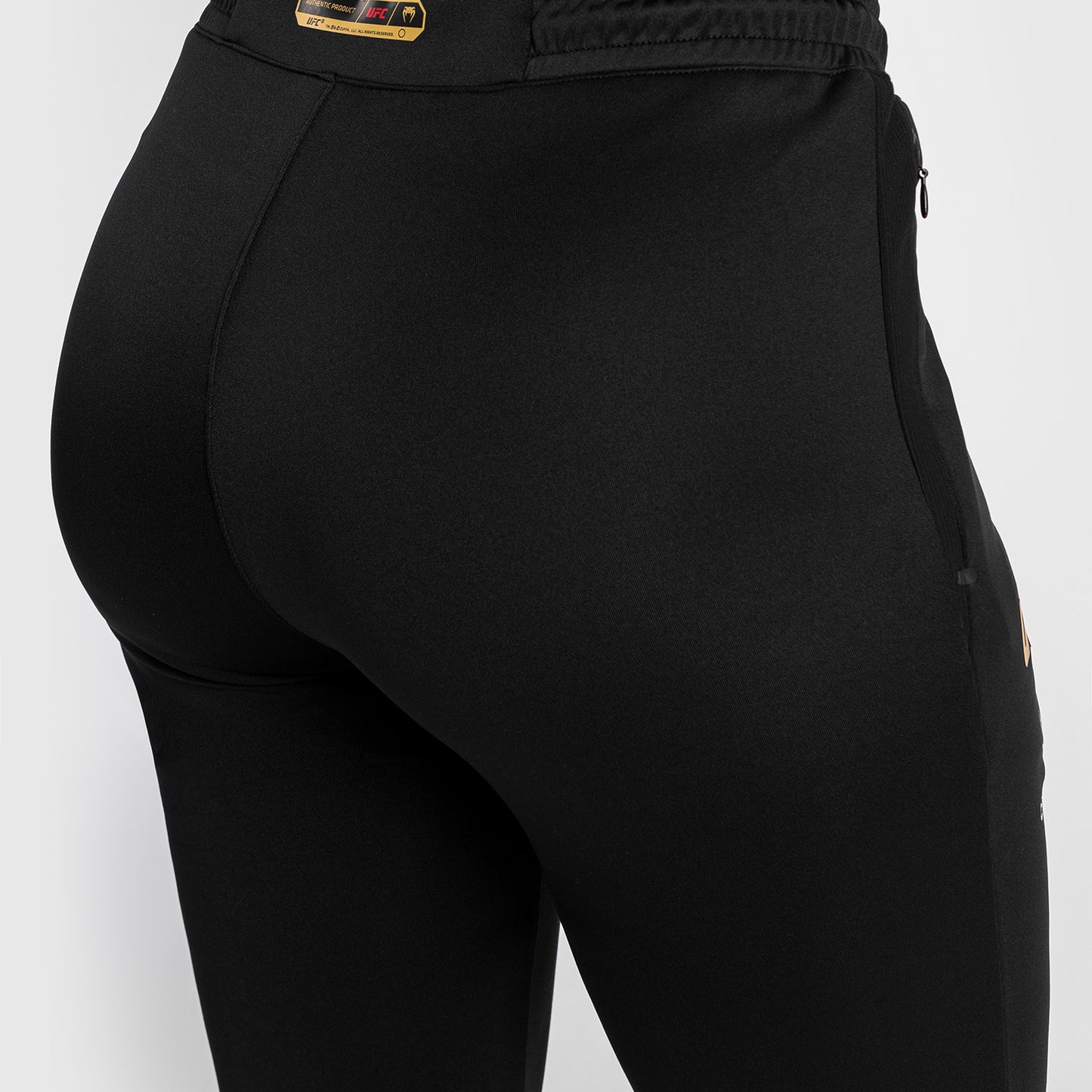 UFC Adrenaline by Venum Authentic Fight Night Walkout-Hose für Frauen Women’s Walkout Pant  - Champion