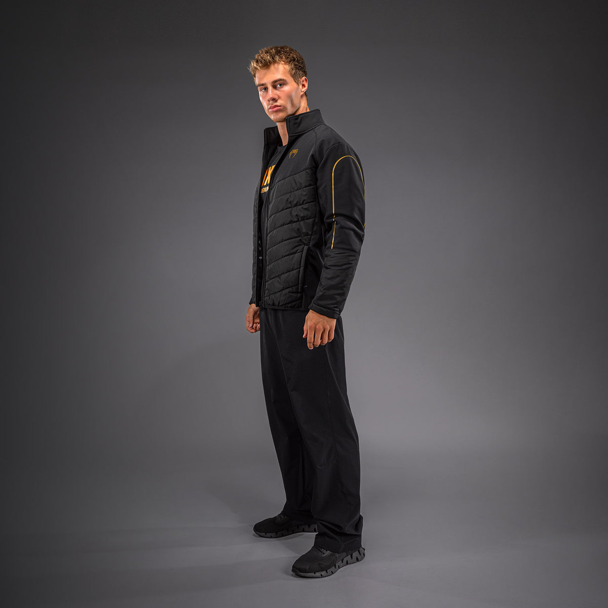 Venum Paddock Softshelljacke - Schwarz/Gold