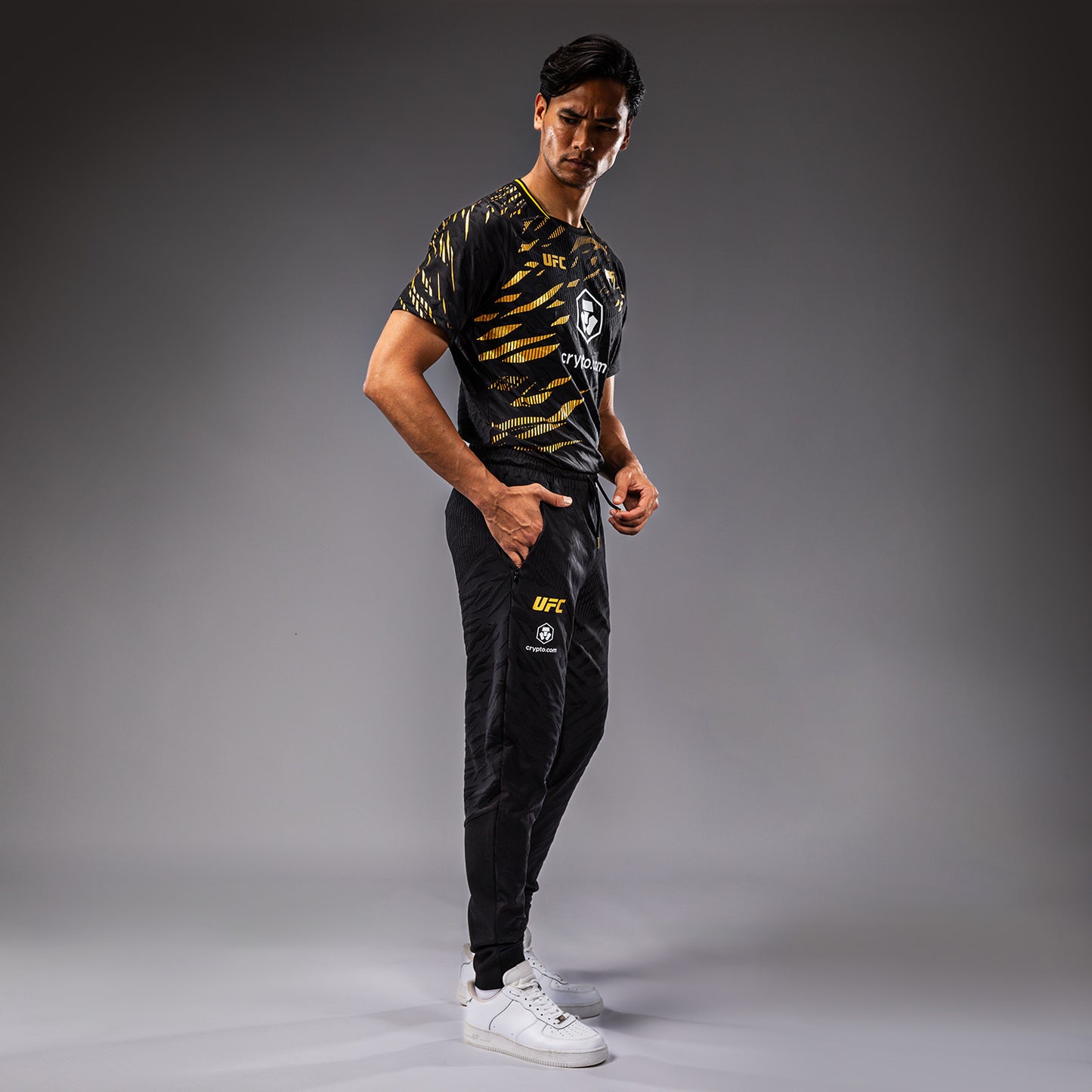 UFC Fusion by Venum Authentic Fight Night Herren Walkout Hose - Champion