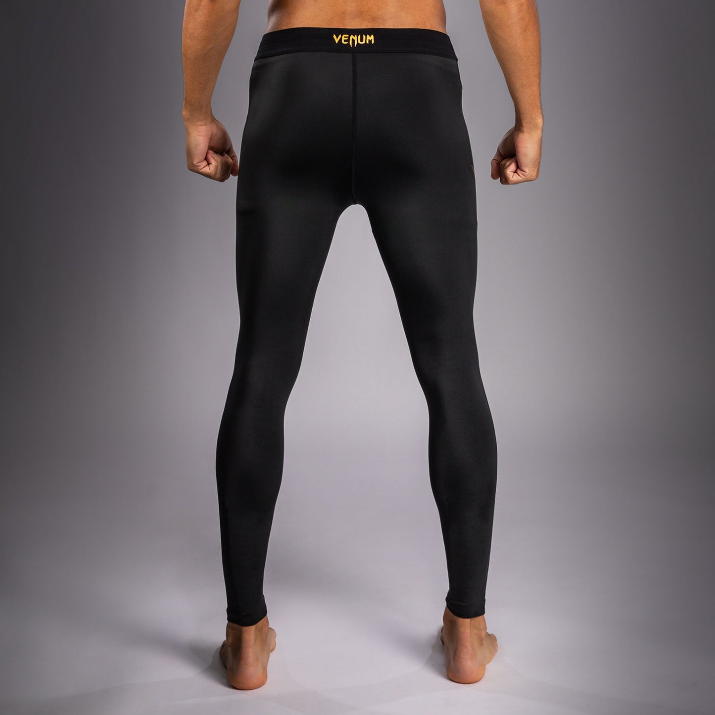 Venum G-Core Spats - Schwarz/Gold