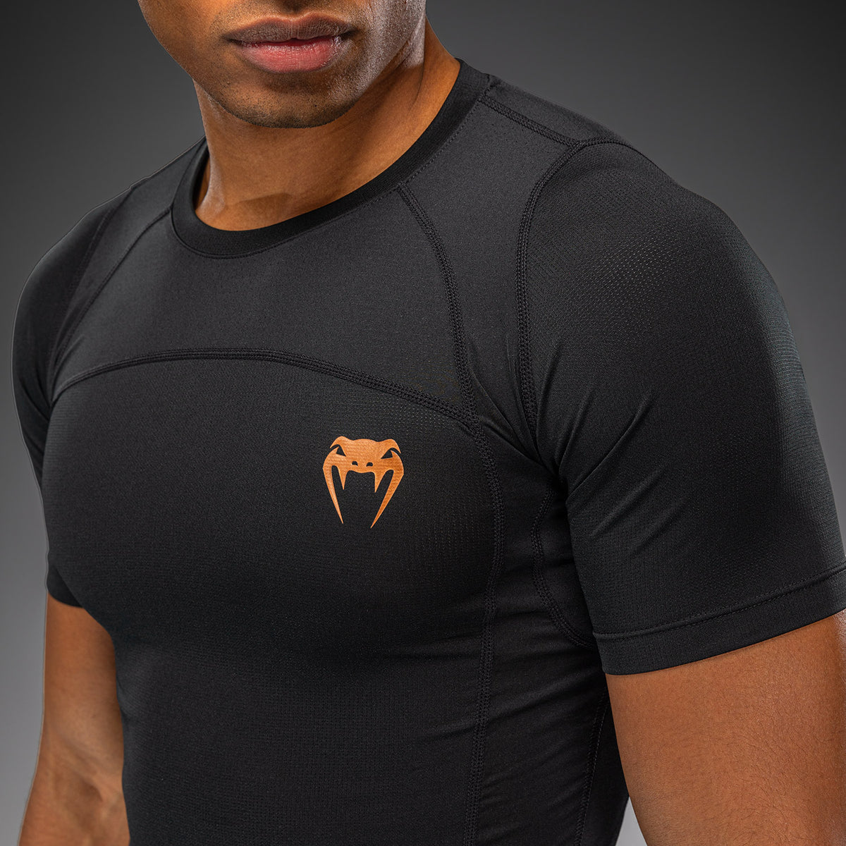 Venum G-Fit Revolution Kurzarm-Rashguard - Schwarz/Kupfer
