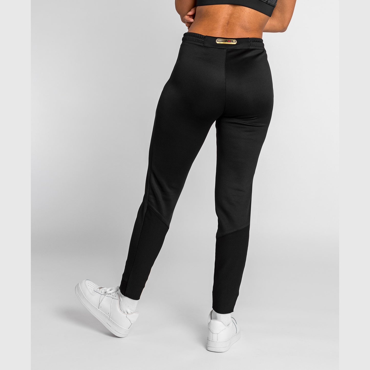 UFC Adrenaline by Venum Authentic Fight Night Walkout-Hose für Frauen Women’s Walkout Pant  - Champion