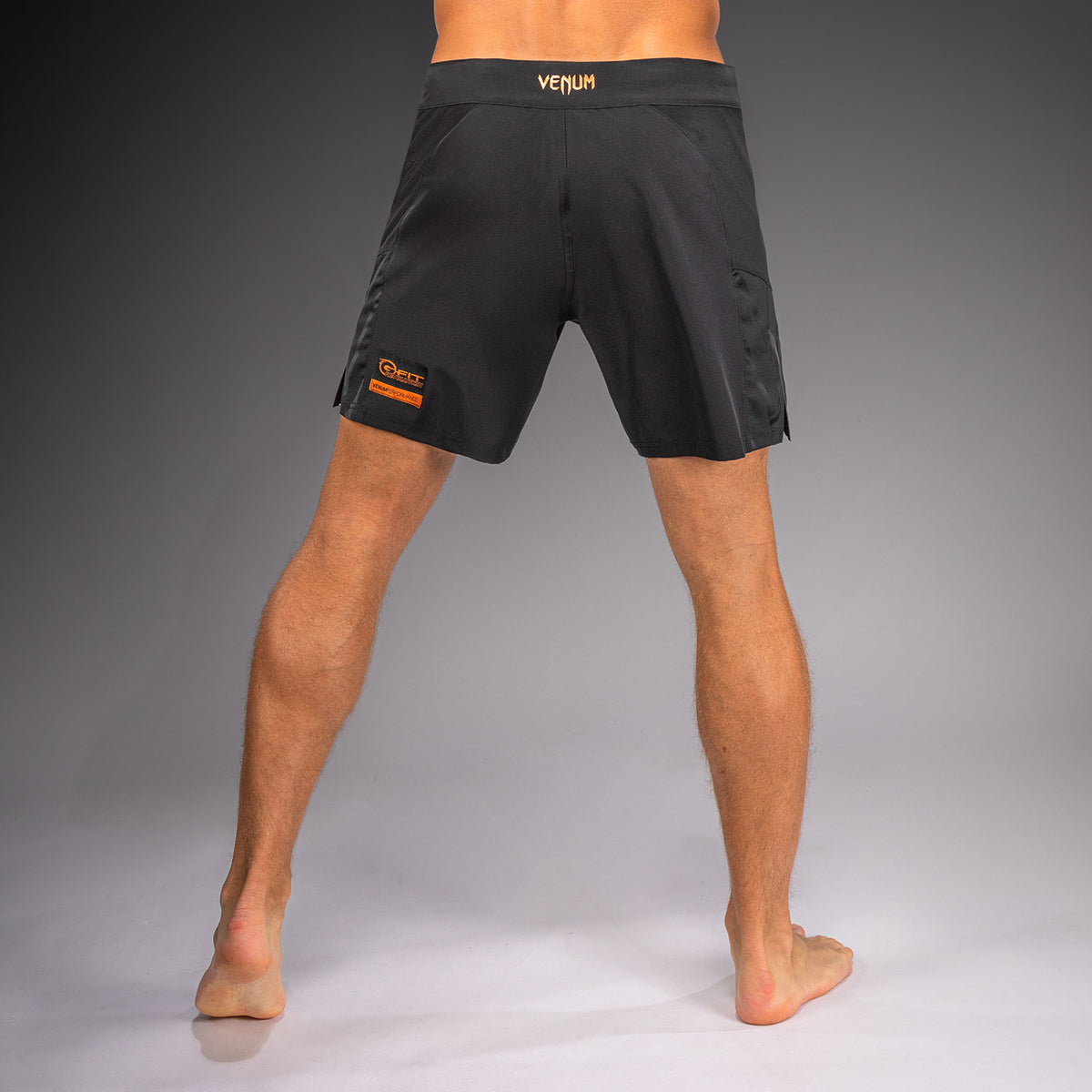 Venum G-Fit Revolution Fightshorts - Schwarz/Kupfer