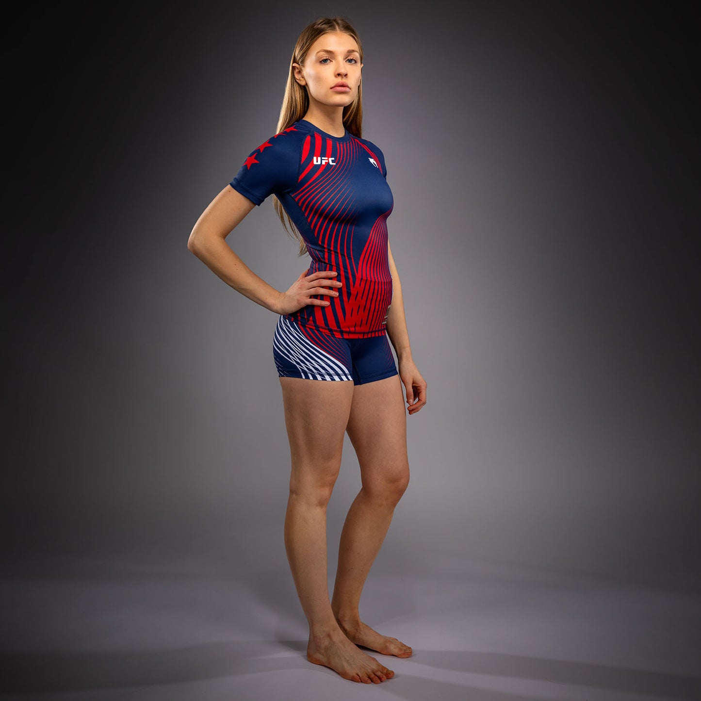 Official UFC Freedom 250 by Venum Authentic Fight Night kurzärmliges Rashguard für Damen - Blau
