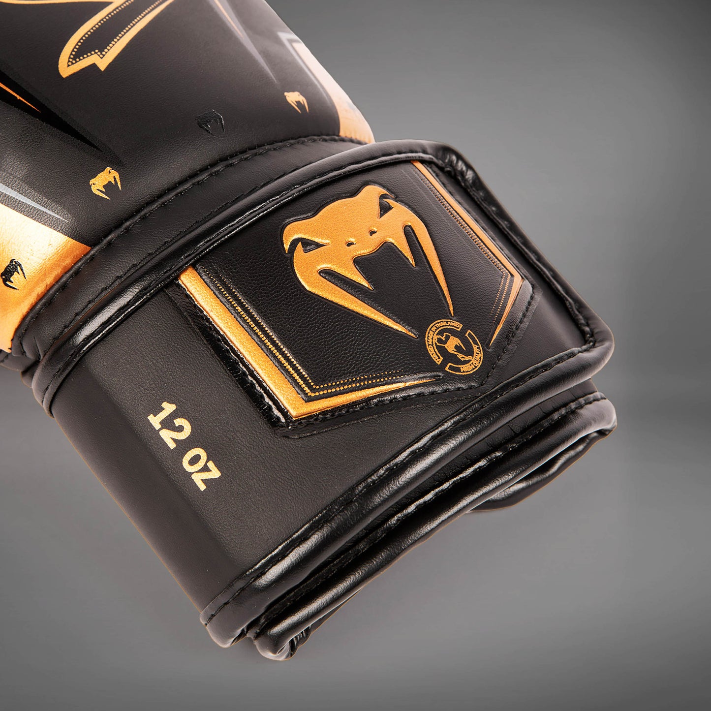 Venum Elite Evo Boxhandschuhe - Schwarz/Bronze