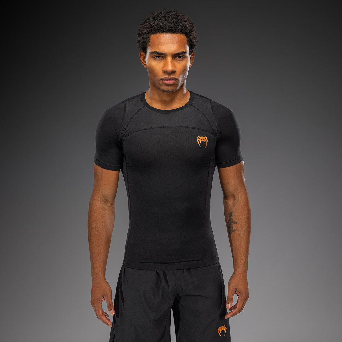 Venum G-Fit Revolution Kurzarm-Rashguard - Schwarz/Kupfer